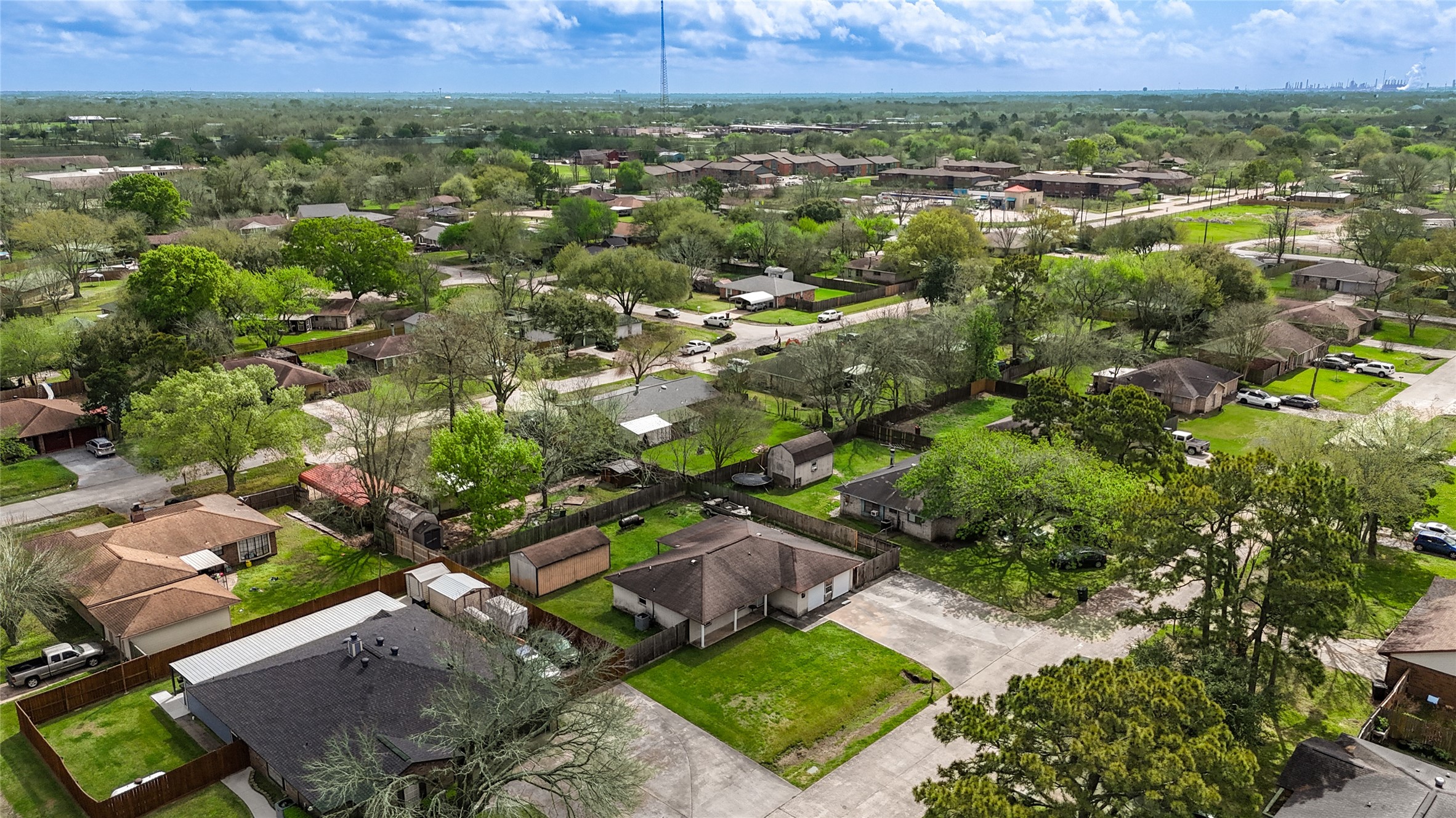 8610 Bluebonnet Street Highlands, TX 77562 - Photo 41 of 45 an aerial view of residential house with outdoor space and trees