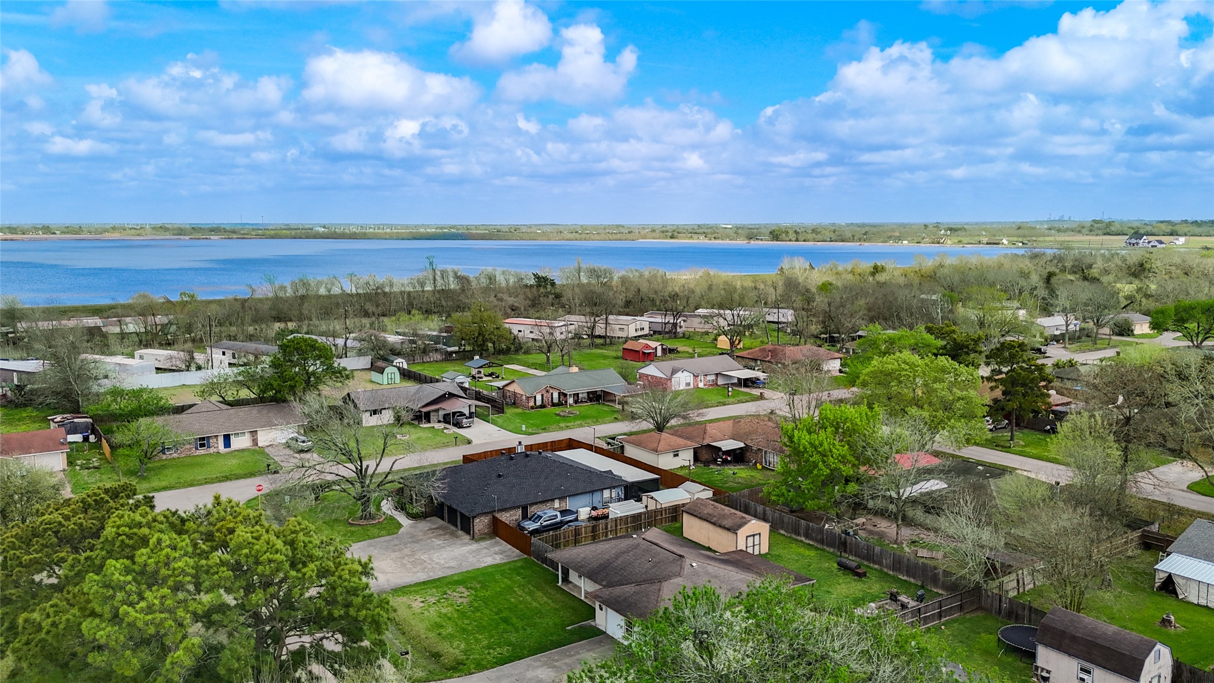 8610 Bluebonnet Street Highlands, TX 77562 - Photo 45 of 45 a view of a city with mountains in the background