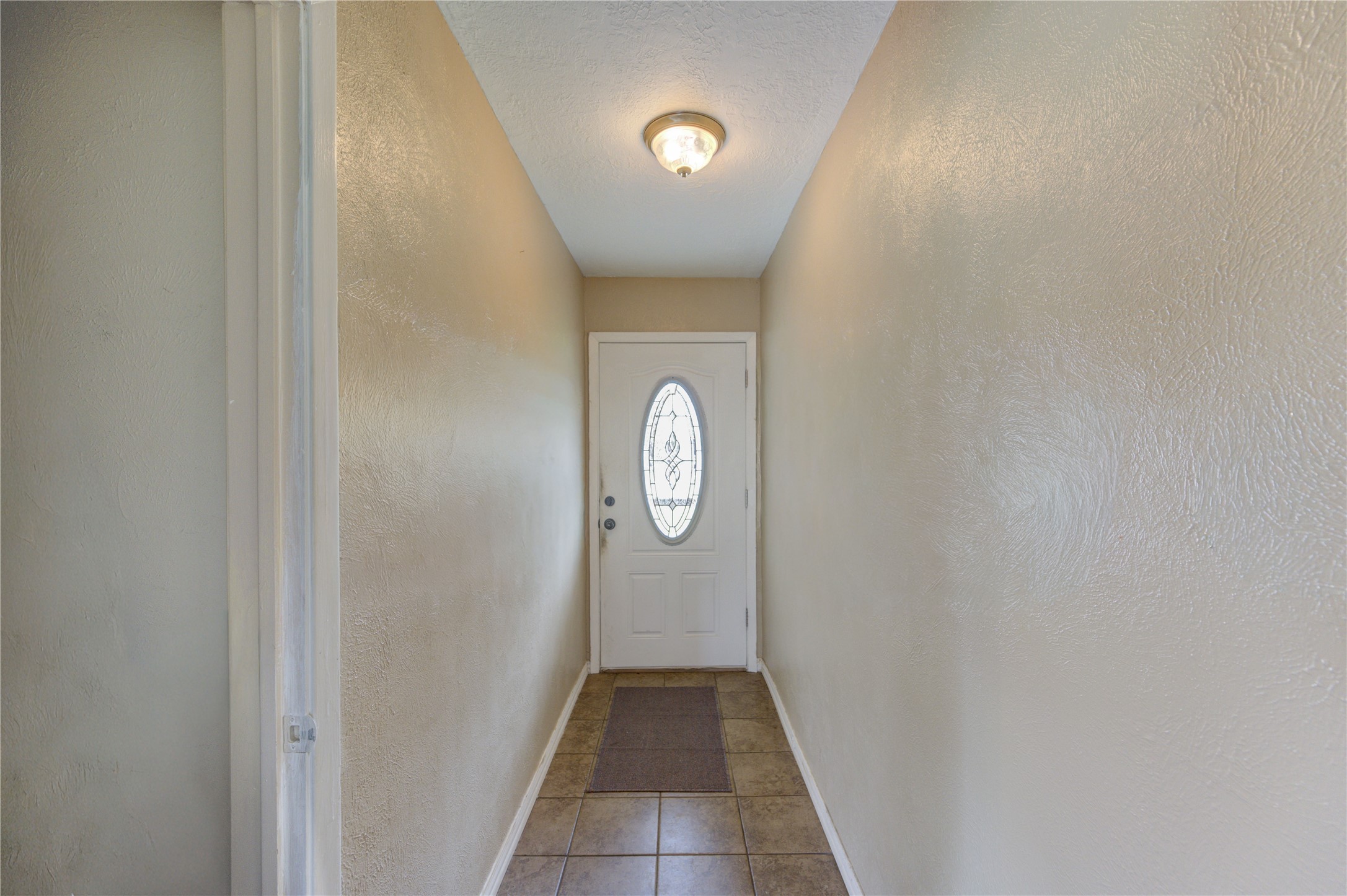 8610 Bluebonnet Street Highlands, TX 77562 - Photo 5 of 45 a view of entryway with wooden floor