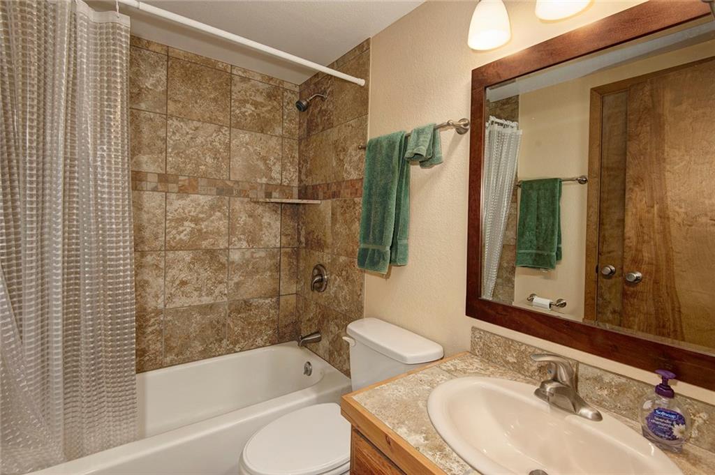 520 Bills Ranch Road, Unit 303 Frisco, CO 80443 - Photo 15 of 25 a bathroom with a sink toilet and shower