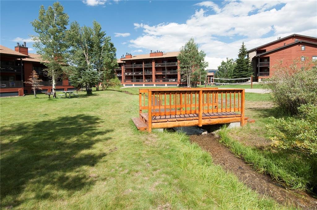 520 Bills Ranch Road, Unit 303 Frisco, CO 80443 - Photo 19 of 25 a view of backyard with a garden and deck