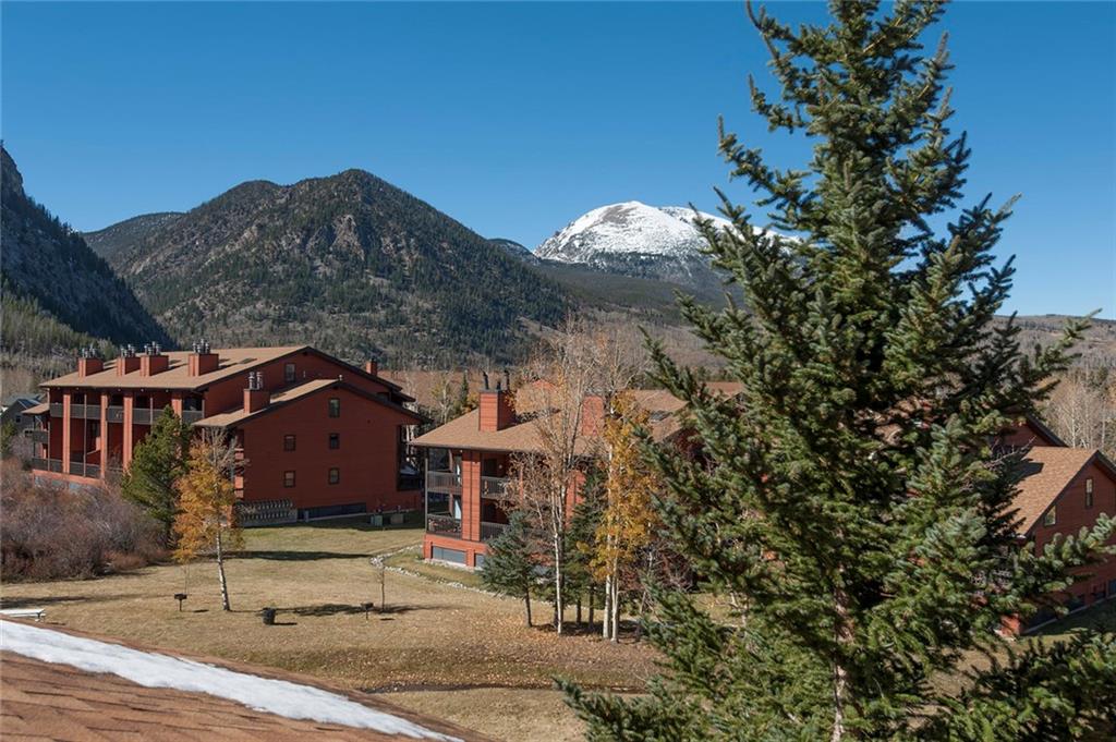 520 Bills Ranch Road, Unit 303 Frisco, CO 80443 - Photo 20 of 25 a front view of a house with a garden