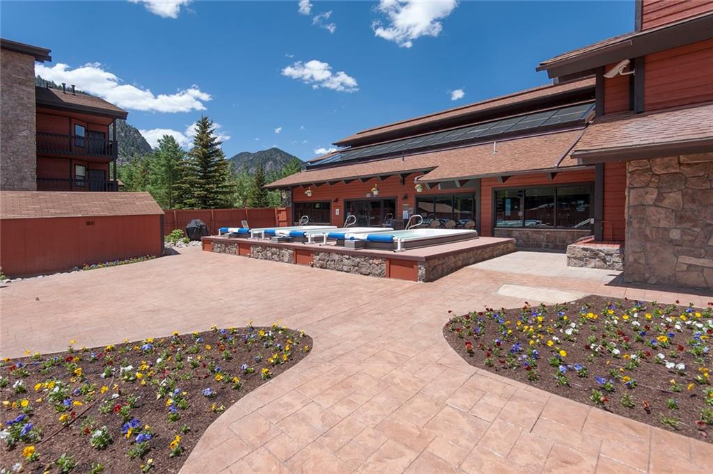 520 Bills Ranch Road, Unit 303 Frisco, CO 80443 - Photo 24 of 25 a view of a chairs and tables in patio
