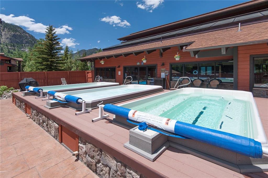 520 Bills Ranch Road, Unit 303 Frisco, CO 80443 - Photo 25 of 25 a swimming pool with outdoor seating and yard