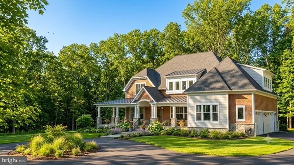 front view of a house next to a yard