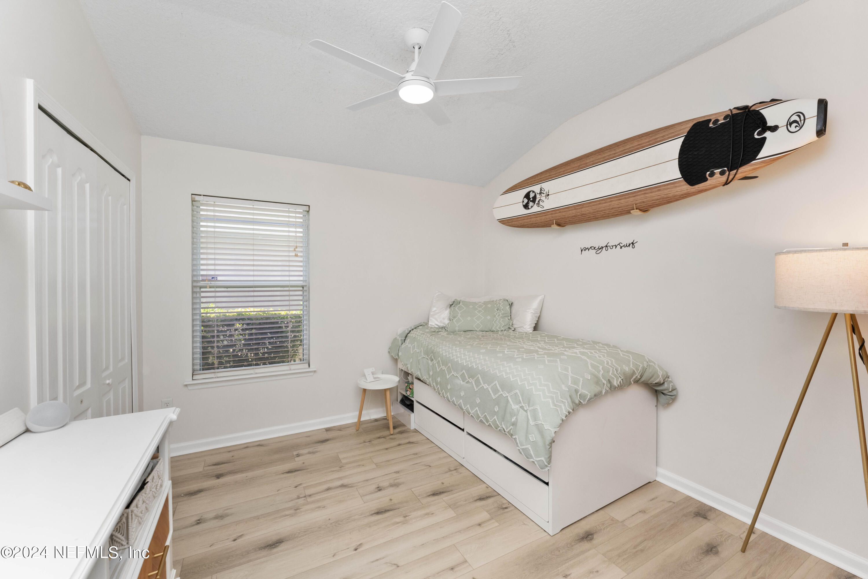 14498 Falling Waters Drive Jacksonville, FL 32258 - Photo 25 of 54 a bedroom with a bed and wooden floor