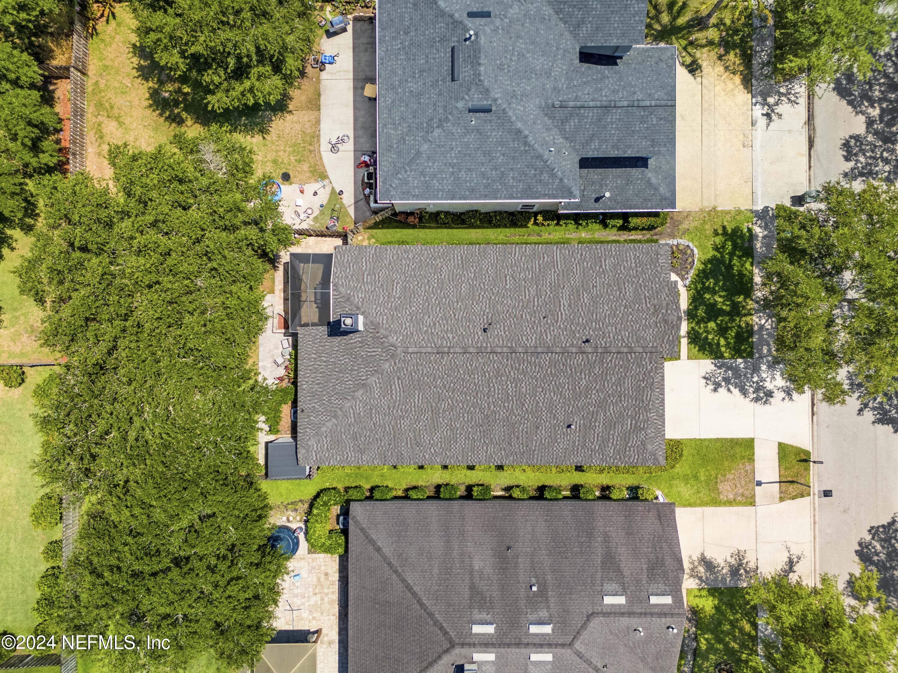 14498 Falling Waters Drive Jacksonville, FL 32258 - Photo 33 of 54 an aerial view of a house with a yard