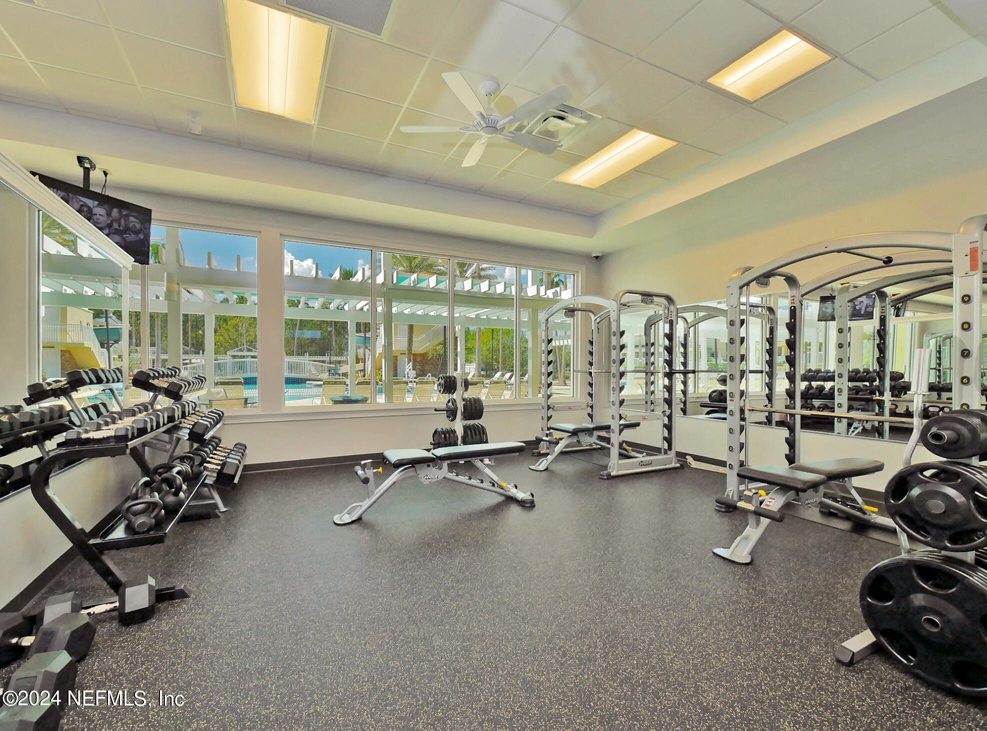 14498 Falling Waters Drive Jacksonville, FL 32258 - Photo 42 of 54 a view of a room with gym equipment