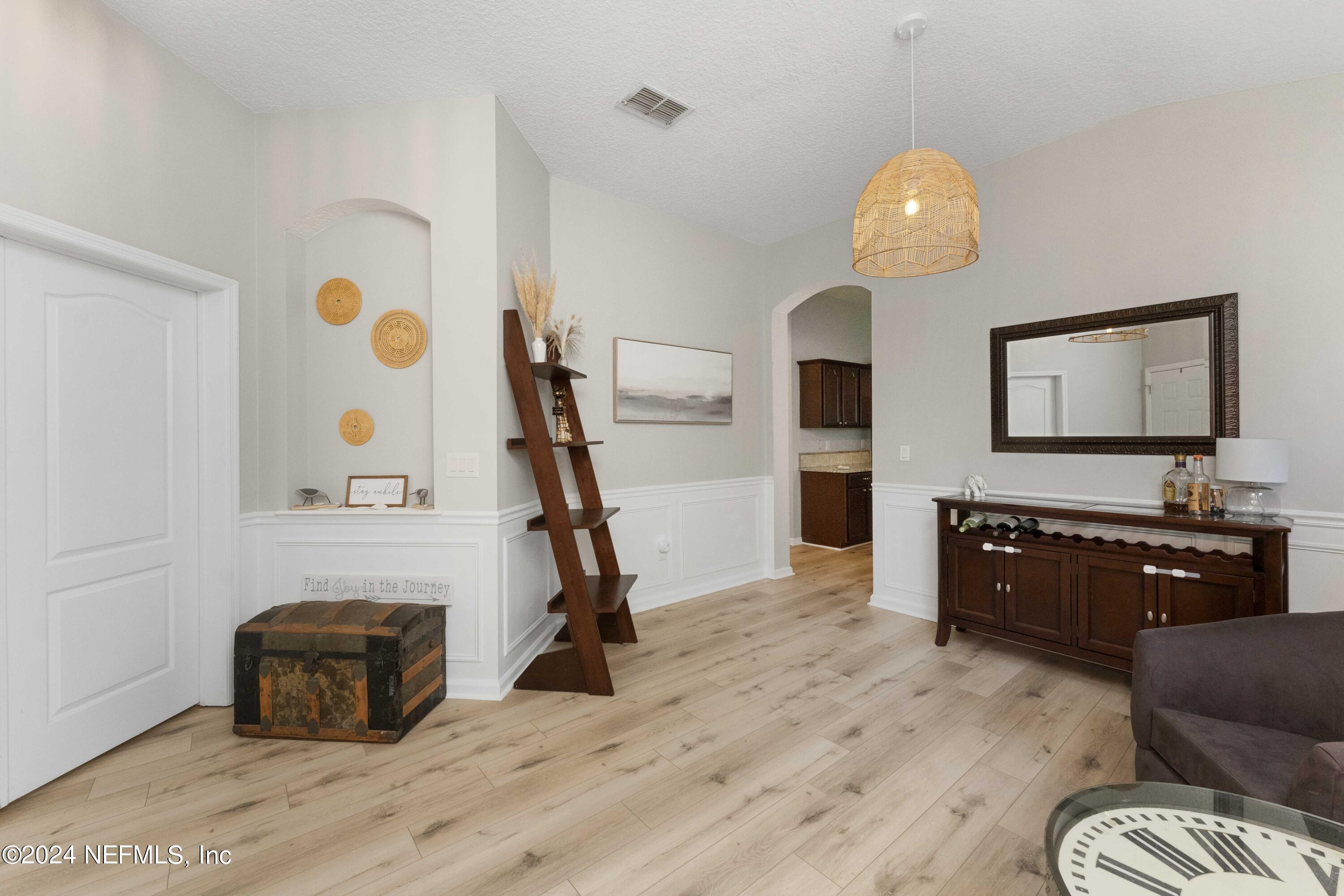 14498 Falling Waters Drive Jacksonville, FL 32258 - Photo 5 of 54 a bedroom with a bed and a dresser