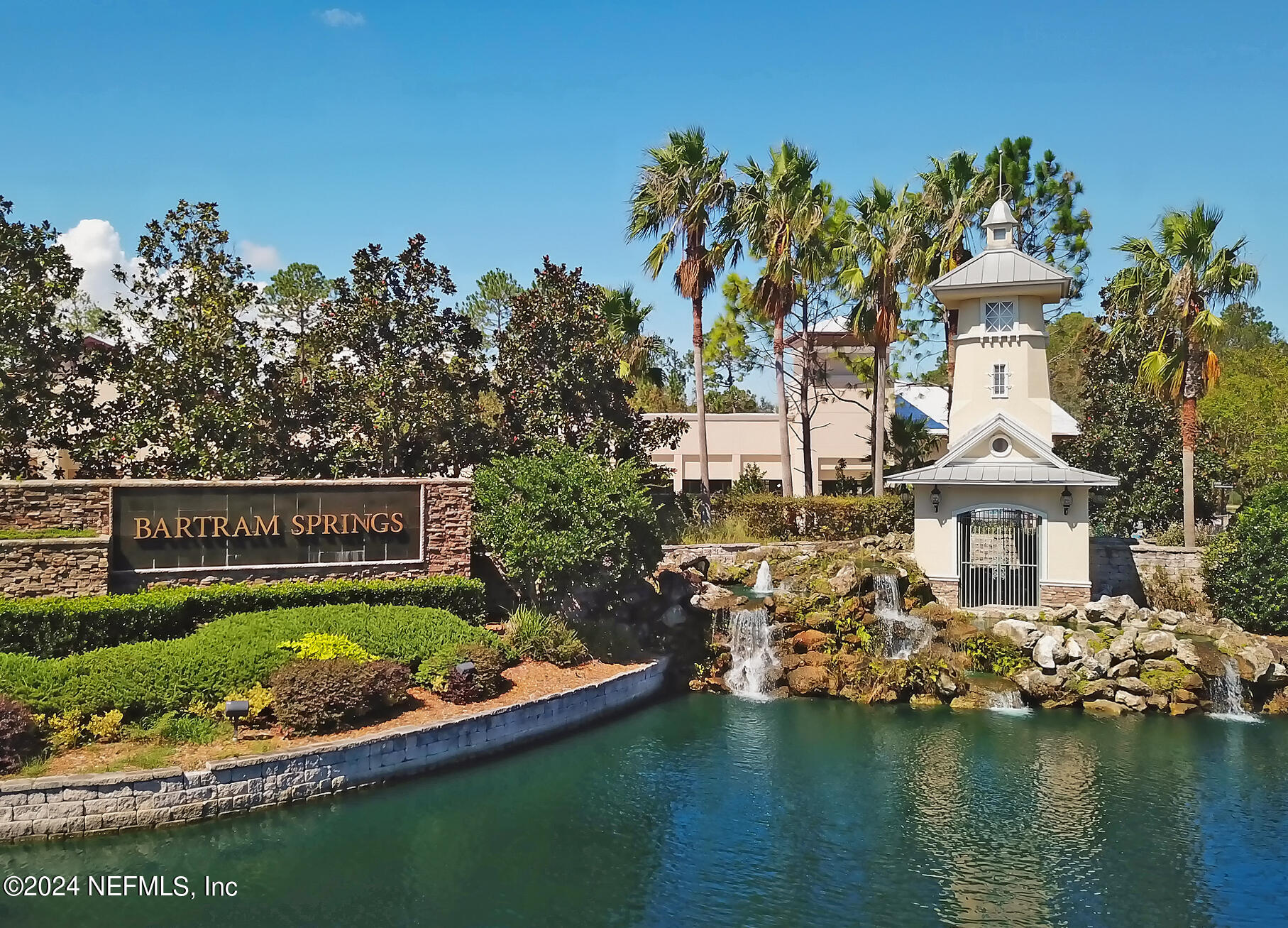 14498 Falling Waters Drive Jacksonville, FL 32258 - Photo 54 of 54 a view of a house with a garden and lake view