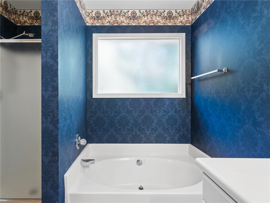 101 Woodbridge Circle Anderson, SC 29621 - Photo 8 of 21 Relax in this tranquil bathroom featuring a soaking tub and separate shower.