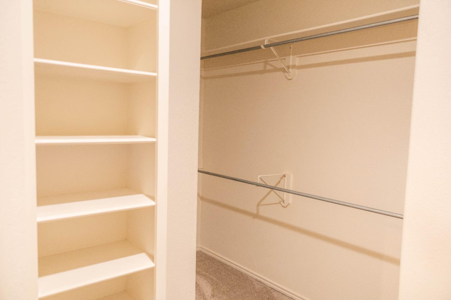 3911 127th Street Lubbock, TX 79423 - Photo 23 of 33 a view of an empty walk in closet