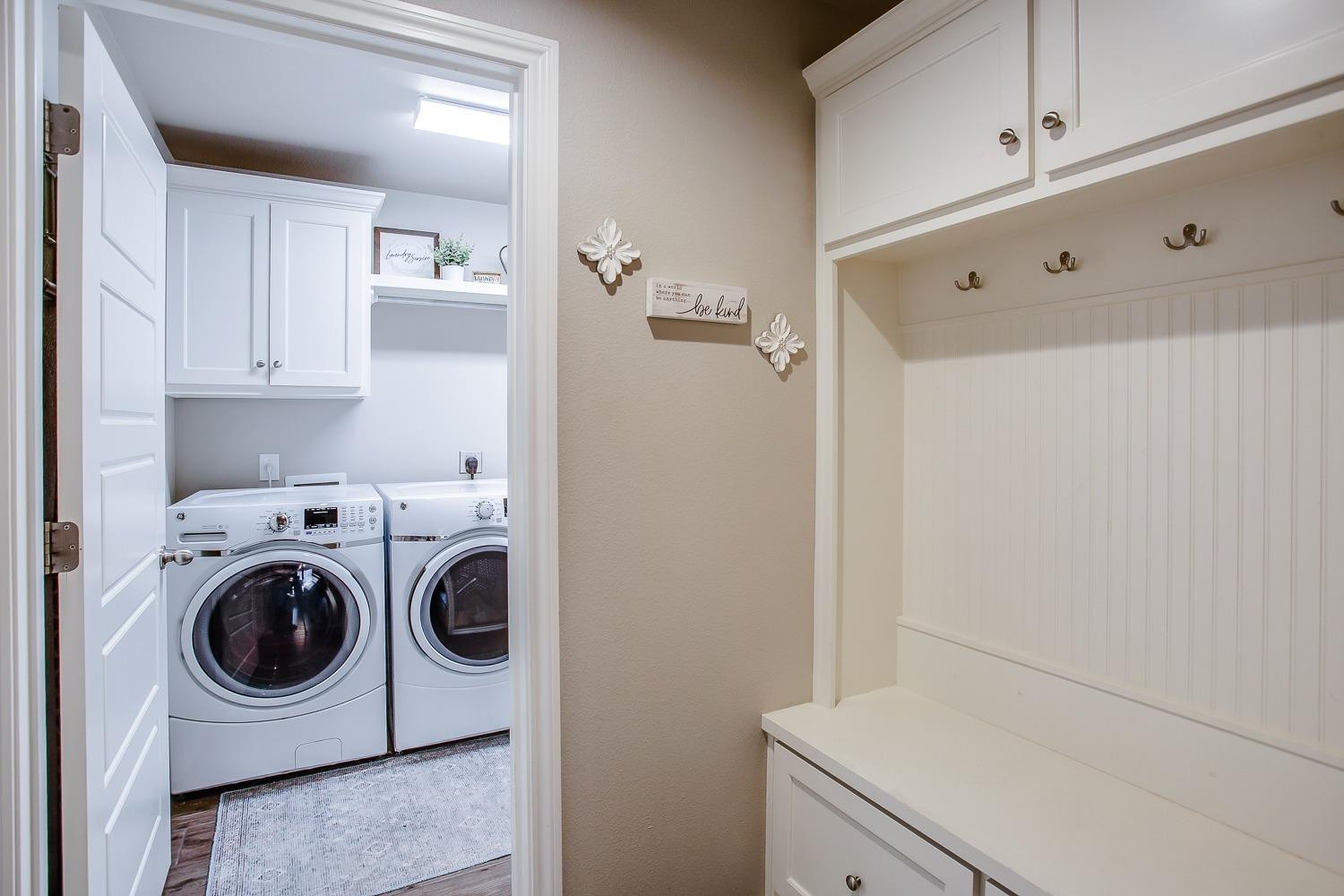3911 127th Street Lubbock, TX 79423 - Photo 31 of 33 a utility room with dryer and washer