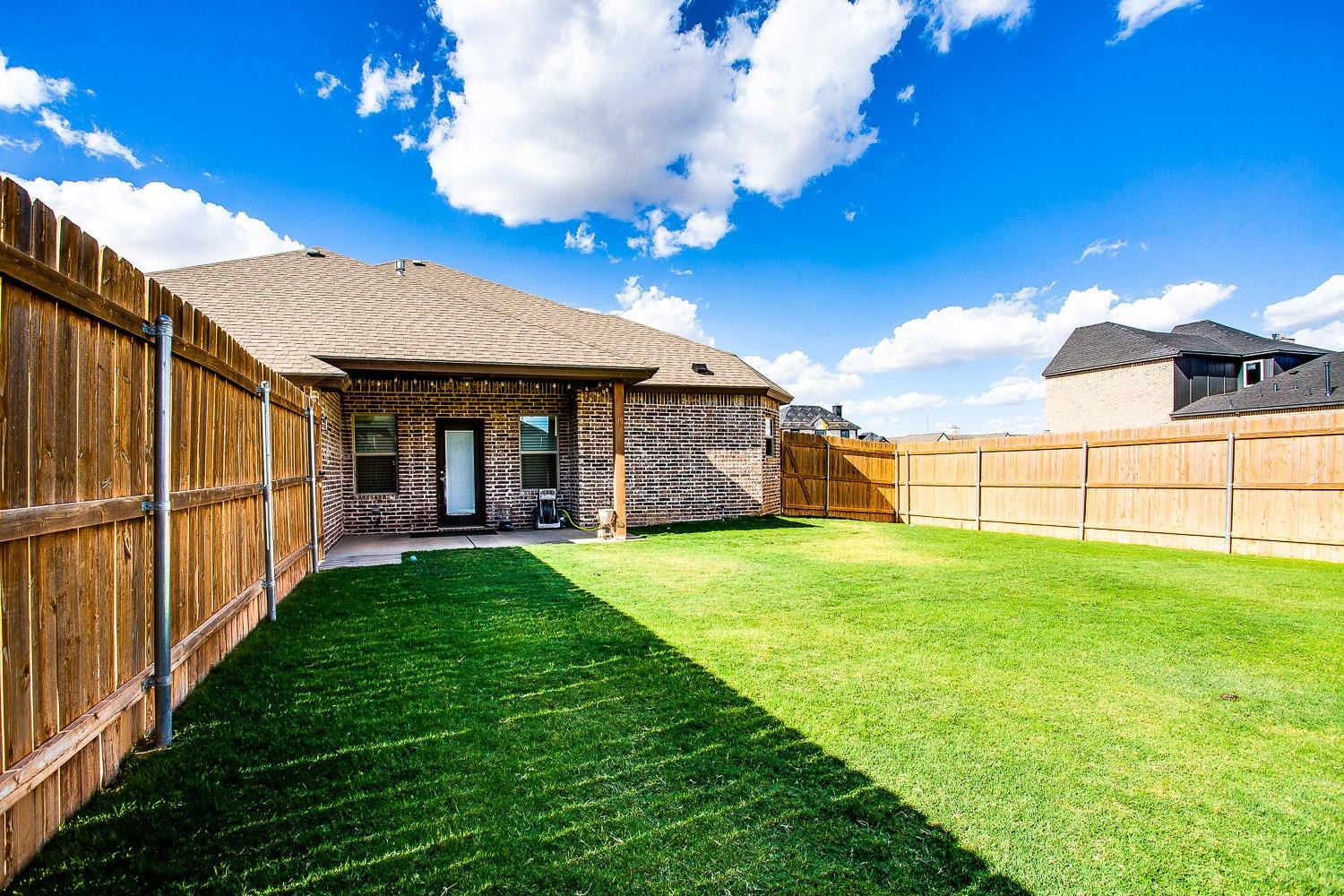 3911 127th Street Lubbock, TX 79423 - Photo 32 of 33 a view of a backyard with garden