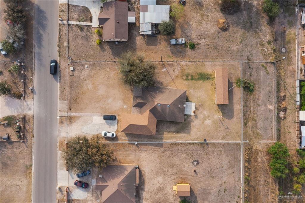 8220 Cardinal Delta Street Mission, TX 78574 - Photo 2 of 18 an aerial view of residential houses with outdoor space