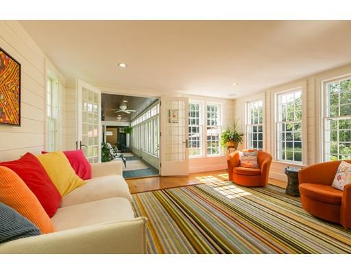 397 River Road Carlisle, MA 01741 - Photo 11 of 30 a living room with furniture and a large window