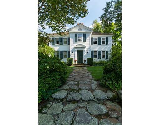 397 River Road Carlisle, MA 01741 - Photo 3 of 30 a front view of a house with garden