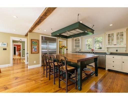 397 River Road Carlisle, MA 01741 - Photo 6 of 30 a view of a dining room with furniture and wooden floor