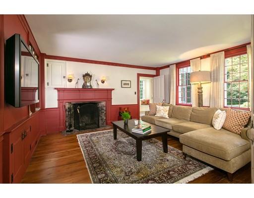 397 River Road Carlisle, MA 01741 - Photo 10 of 30 a living room with furniture and a fireplace