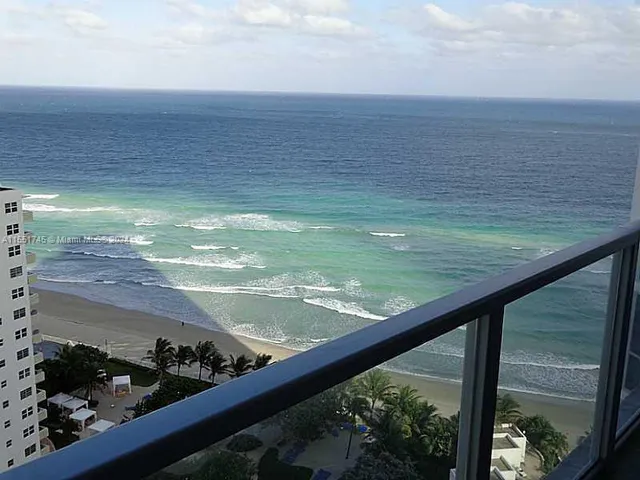 a view of ocean from a balcony