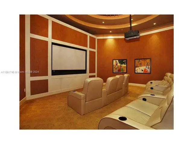 a dining room with a table and chairs