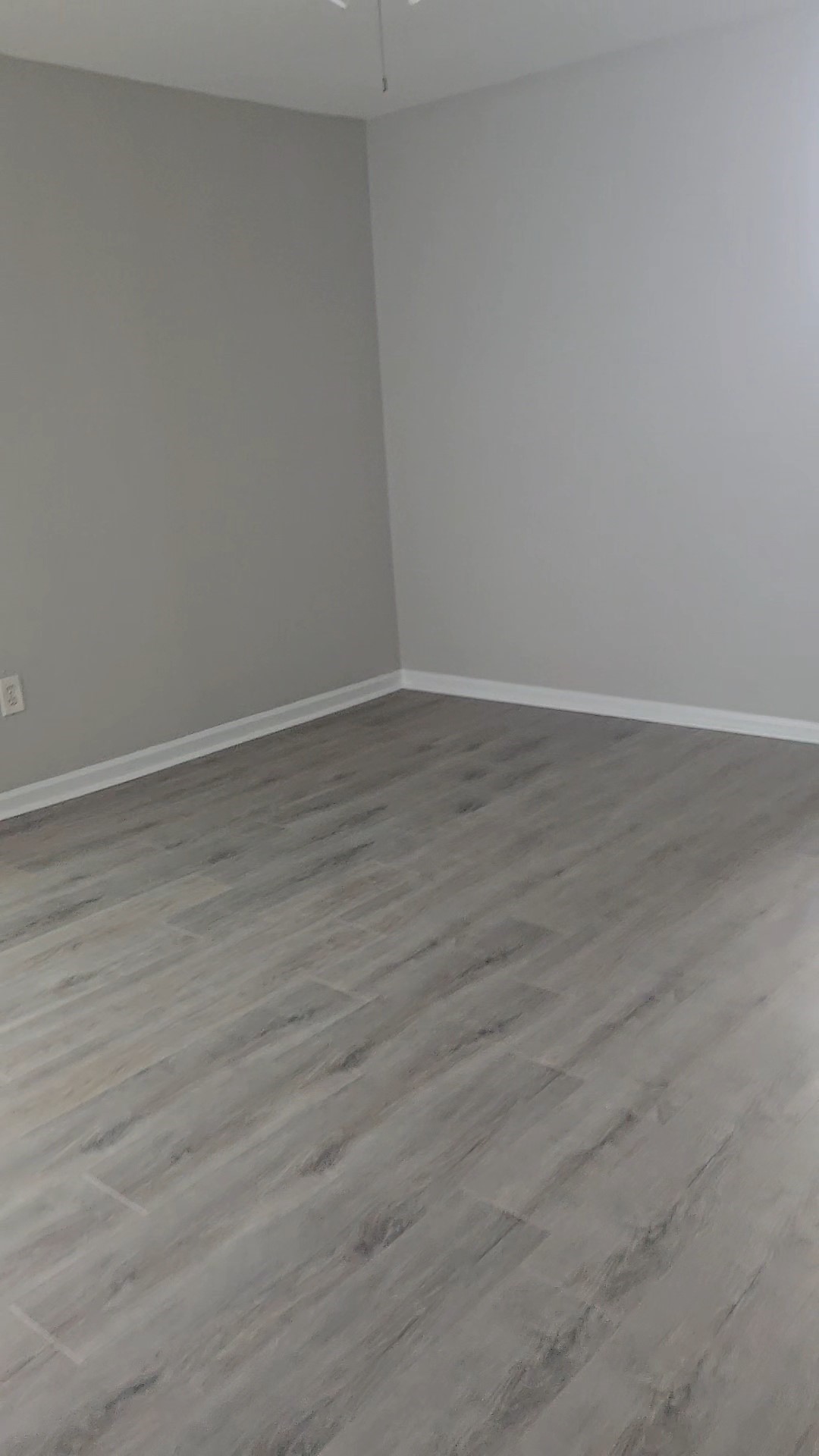 4834 Clover Street Houston, TX 77033 - Photo 2 of 10 a view of an empty room with wooden floor