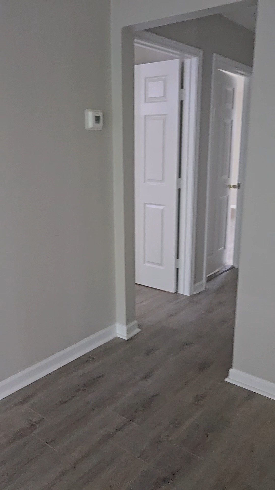 4834 Clover Street Houston, TX 77033 - Photo 3 of 10 an empty room with wooden floor