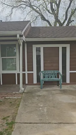 a view of a house with a patio