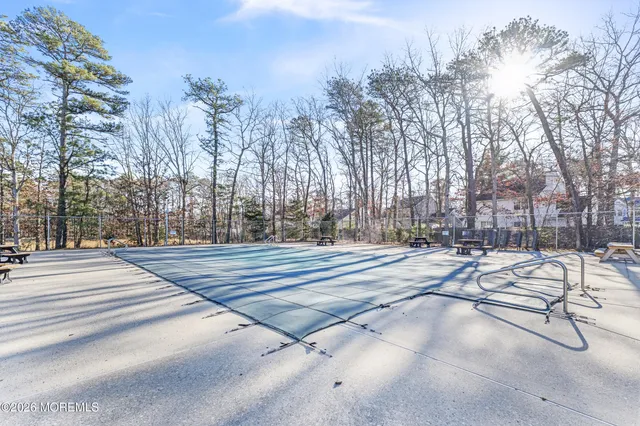 a view of pathway with a yard