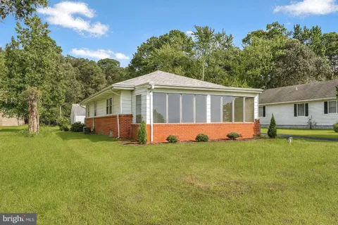 a view of a house with a big yard