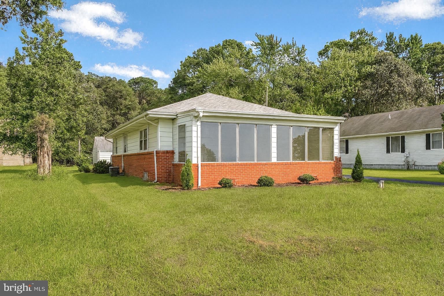 6827 Bellevue Road Royal Oak, MD 21662 - Photo 1 of 32 a view of a house with a big yard