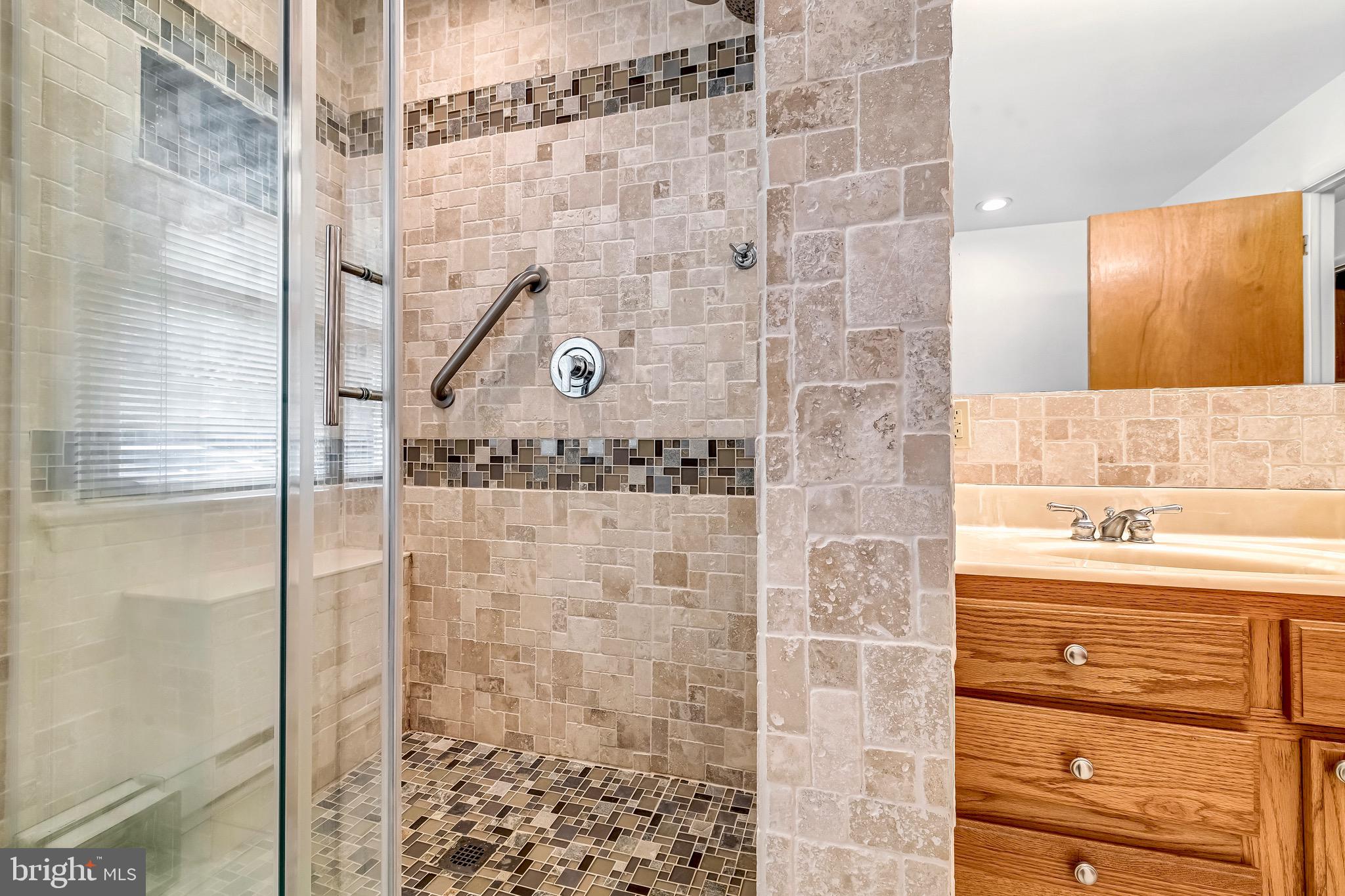 6827 Bellevue Road Royal Oak, MD 21662 - Photo 11 of 32 a bathroom with a shower and a sink