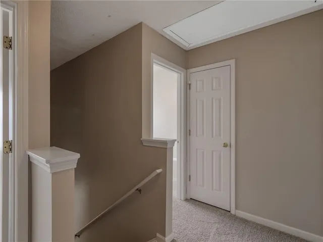 a view of a hallway with entryway