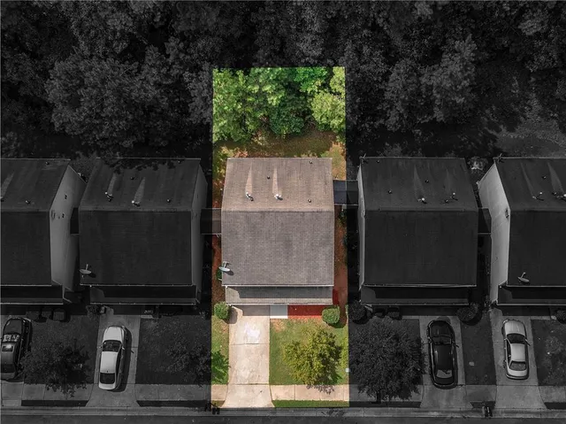 an old building with trees in front of it