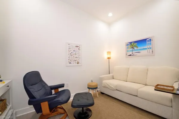 a living room with furniture and a couch