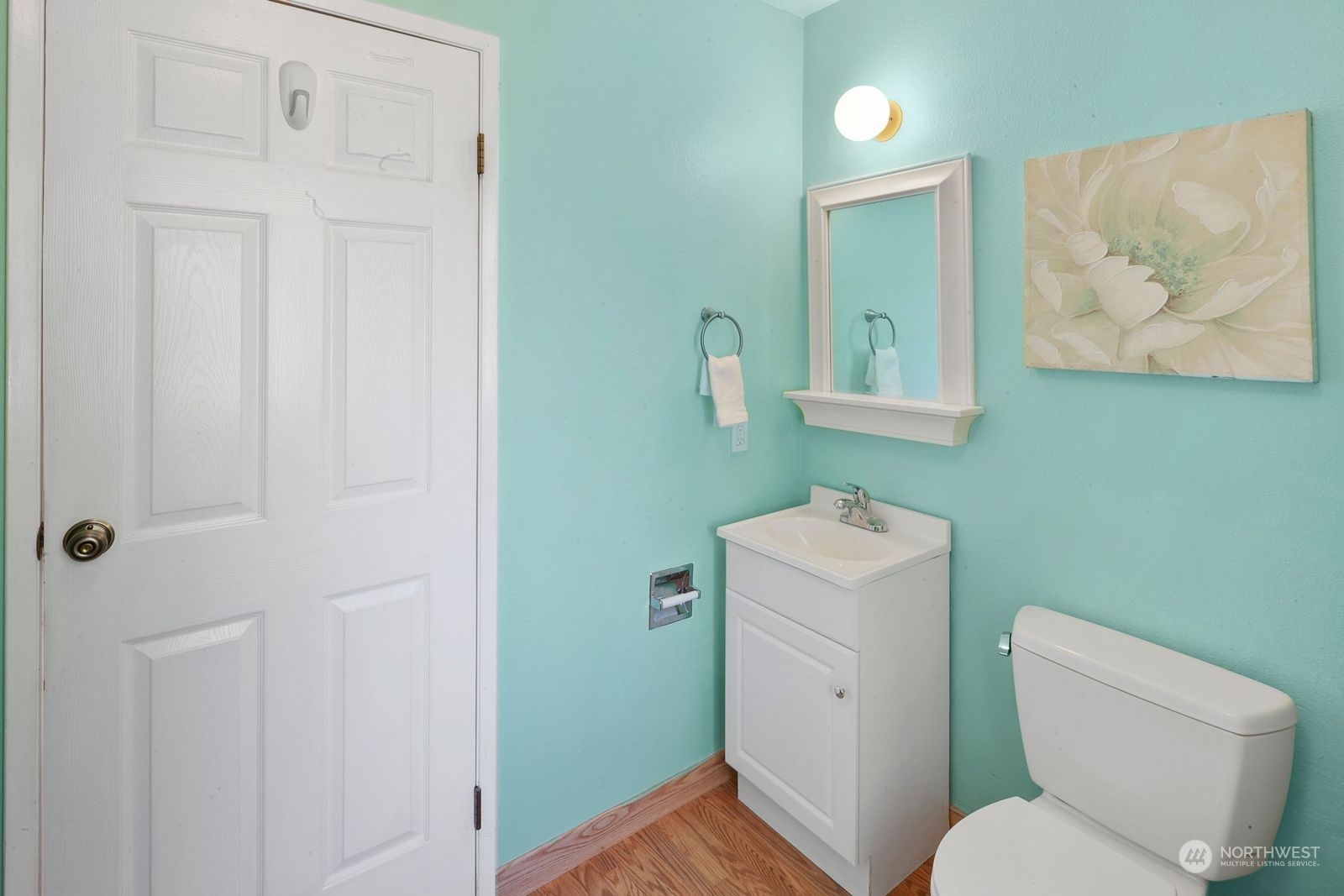 924 South 29th Court Renton, WA 98055 - Photo 13 of 27 a white toilet sitting next to a bathroom sink