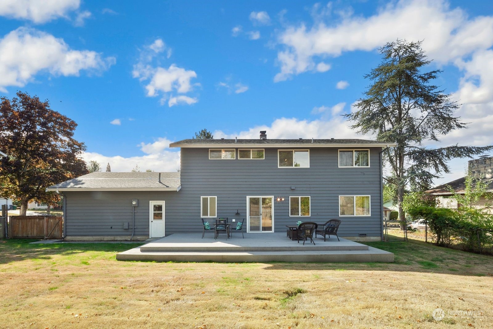 924 South 29th Court Renton, WA 98055 - Photo 24 of 27 a view of a house with swimming pool and a yard