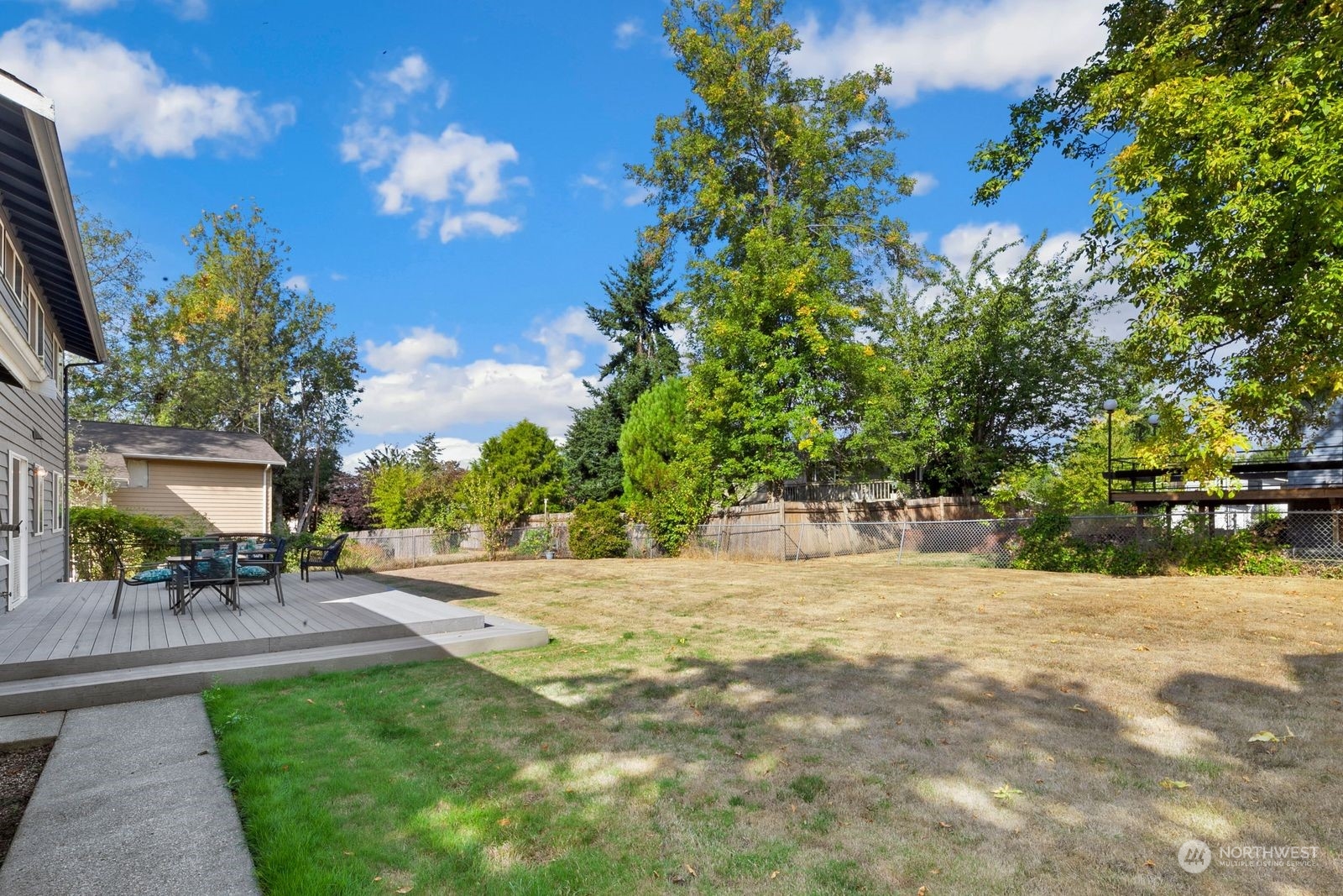 924 South 29th Court Renton, WA 98055 - Photo 26 of 27 a backyard of a house with table and chairs