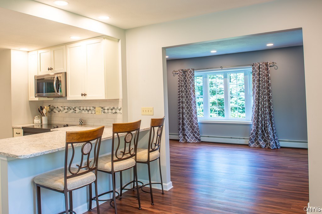 852 Strong Road Tully, NY 13159 - Photo 18 of 42 Kitchen open to Dining Room