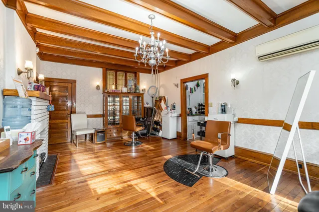 a view of a workspace with furniture