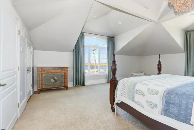 a bed room with a bed and a view