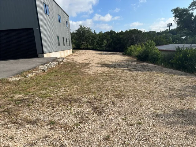 a view of a backyard of a house
