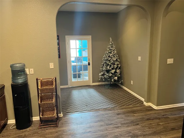 wooden floor in an empty room and window