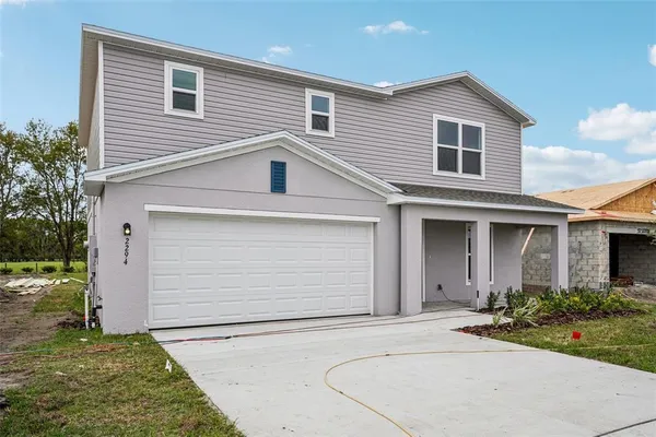 a front view of house with yard