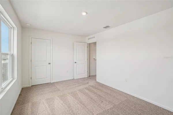 a view of small space with wooden floor