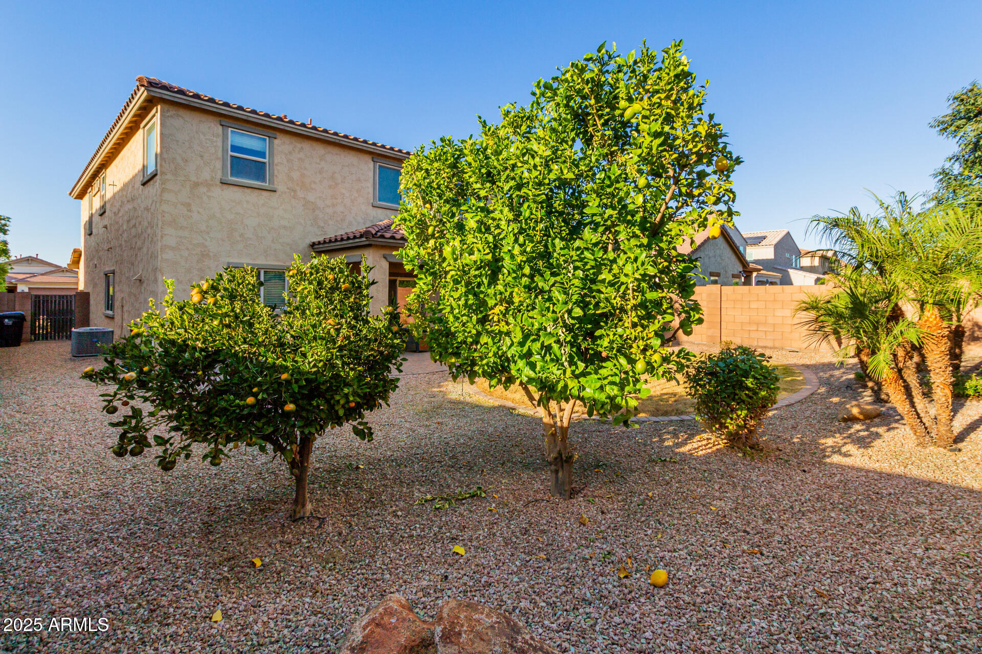 2665 East Gillcrest Road Gilbert, AZ 85298 - Photo 33 of 48 a backyard of a house with lots of green space