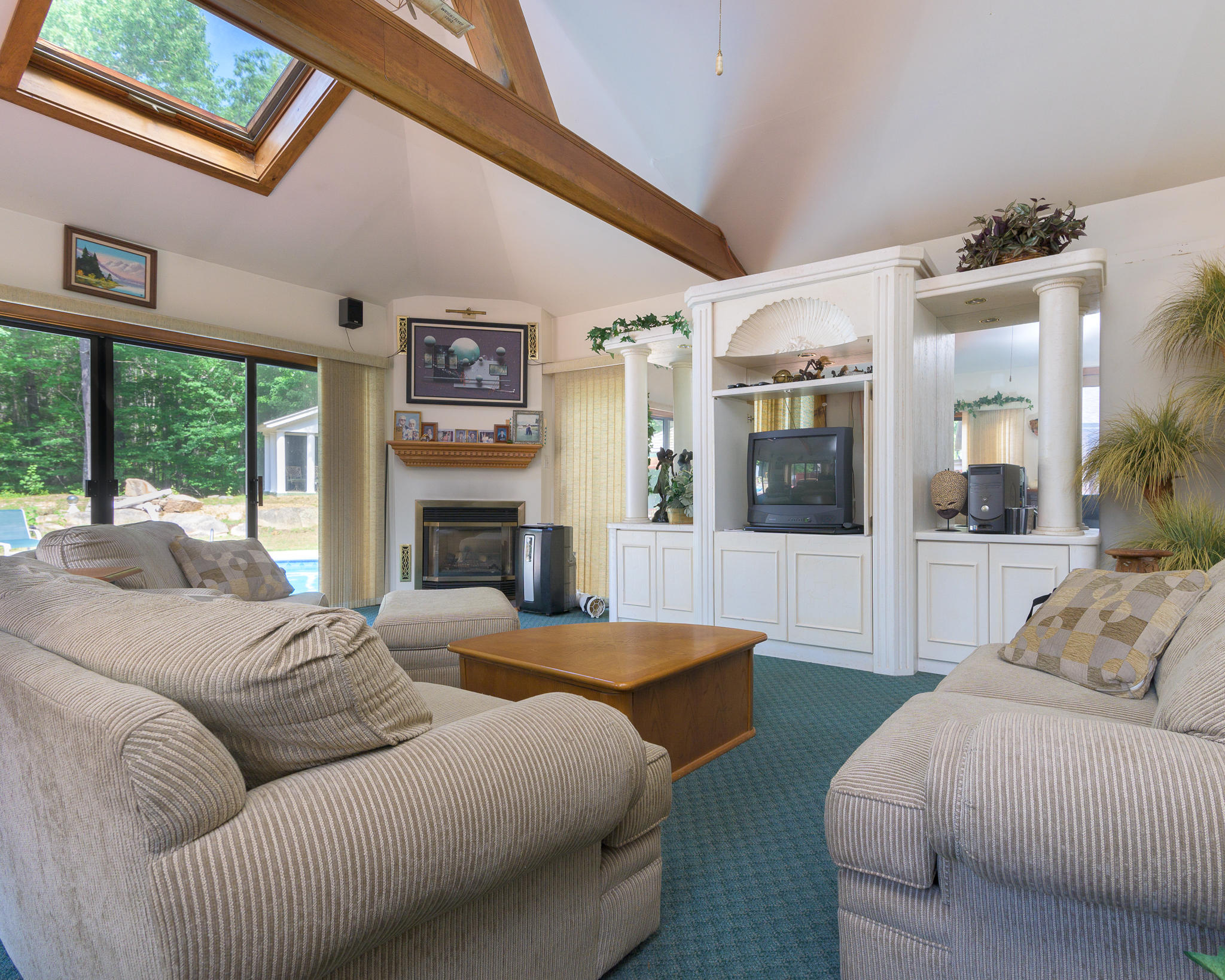 1 Wolf Creek Road York, ME 03902 - Photo 7 of 38 Sunroom with fireplace