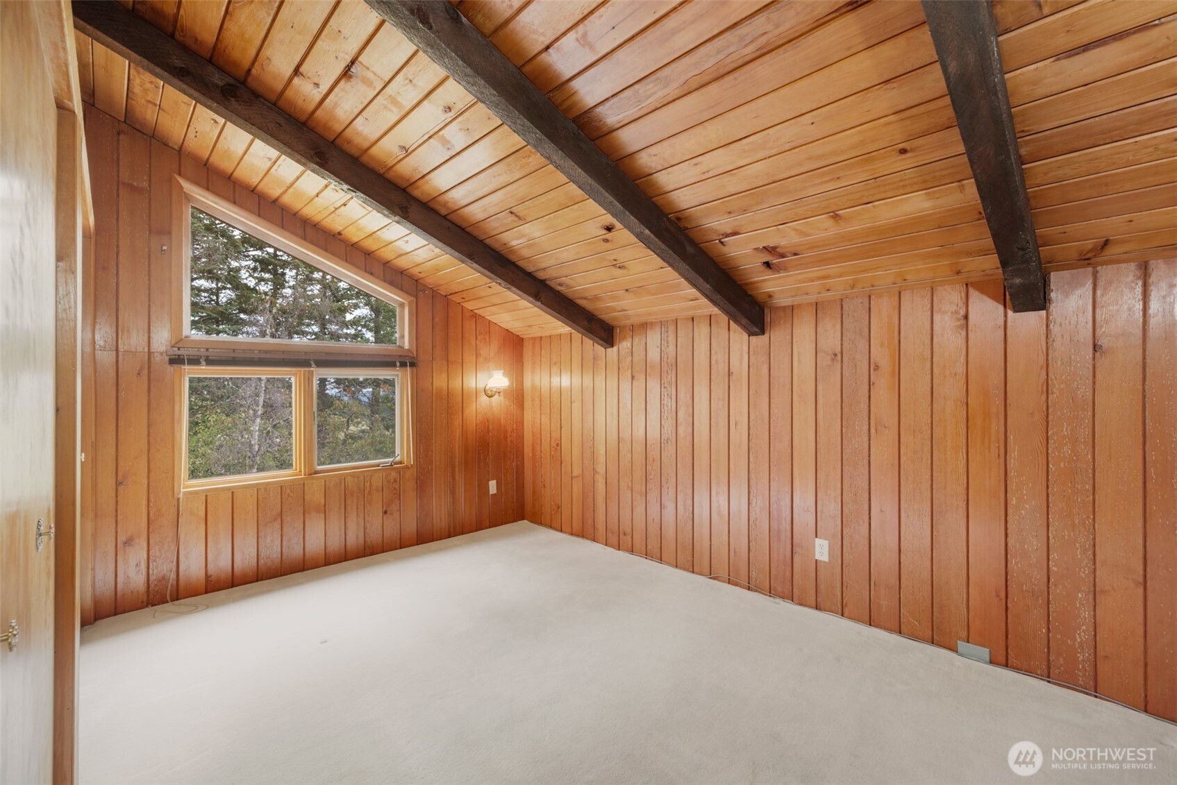 453 Stampede Drive Sequim, WA 98382 - Photo 17 of 36 a view of an empty room with a window
