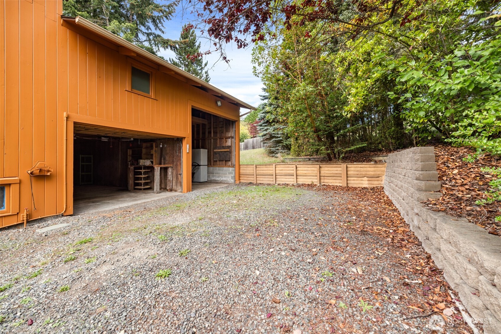 453 Stampede Drive Sequim, WA 98382 - Photo 30 of 36 a view of a entrance gate of the house and trees