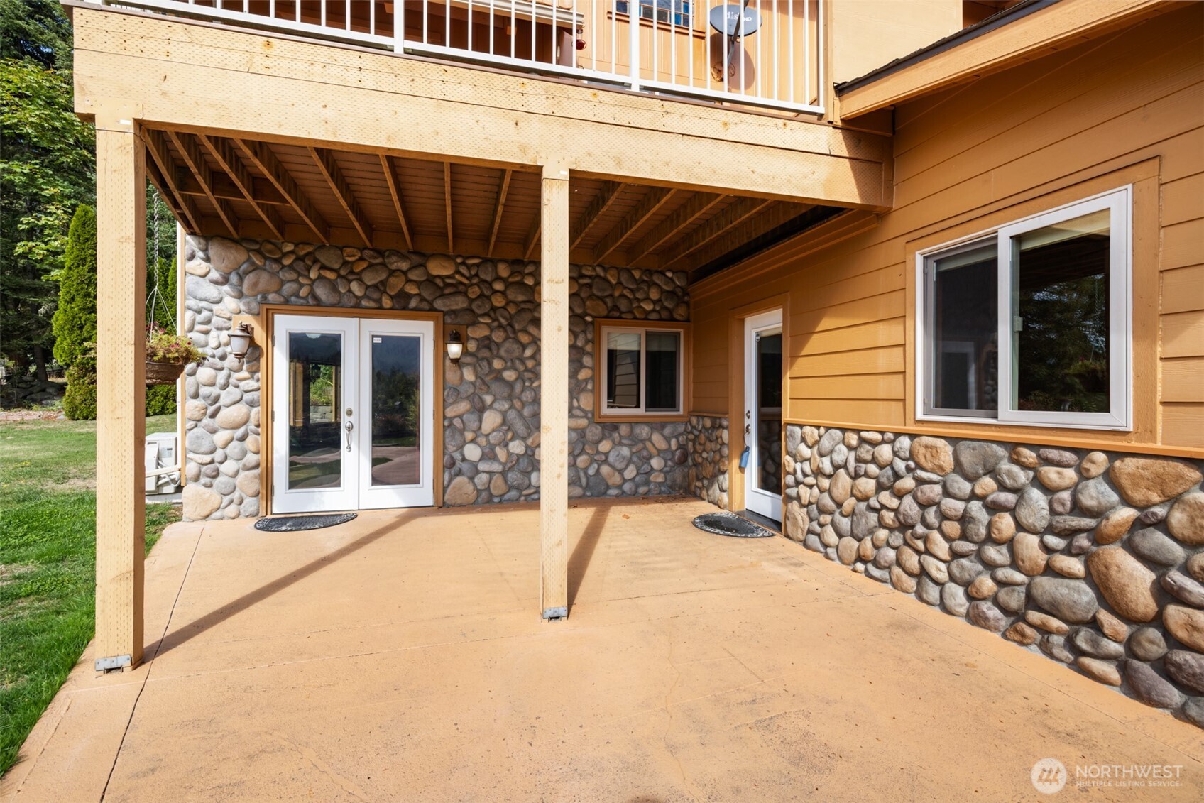 453 Stampede Drive Sequim, WA 98382 - Photo 31 of 36 a view of a house with a large window
